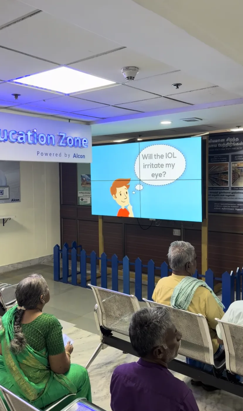 Patients viewing an eye-care education program at Aravind Eye Hospital